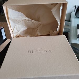 Empty Birman shoe box